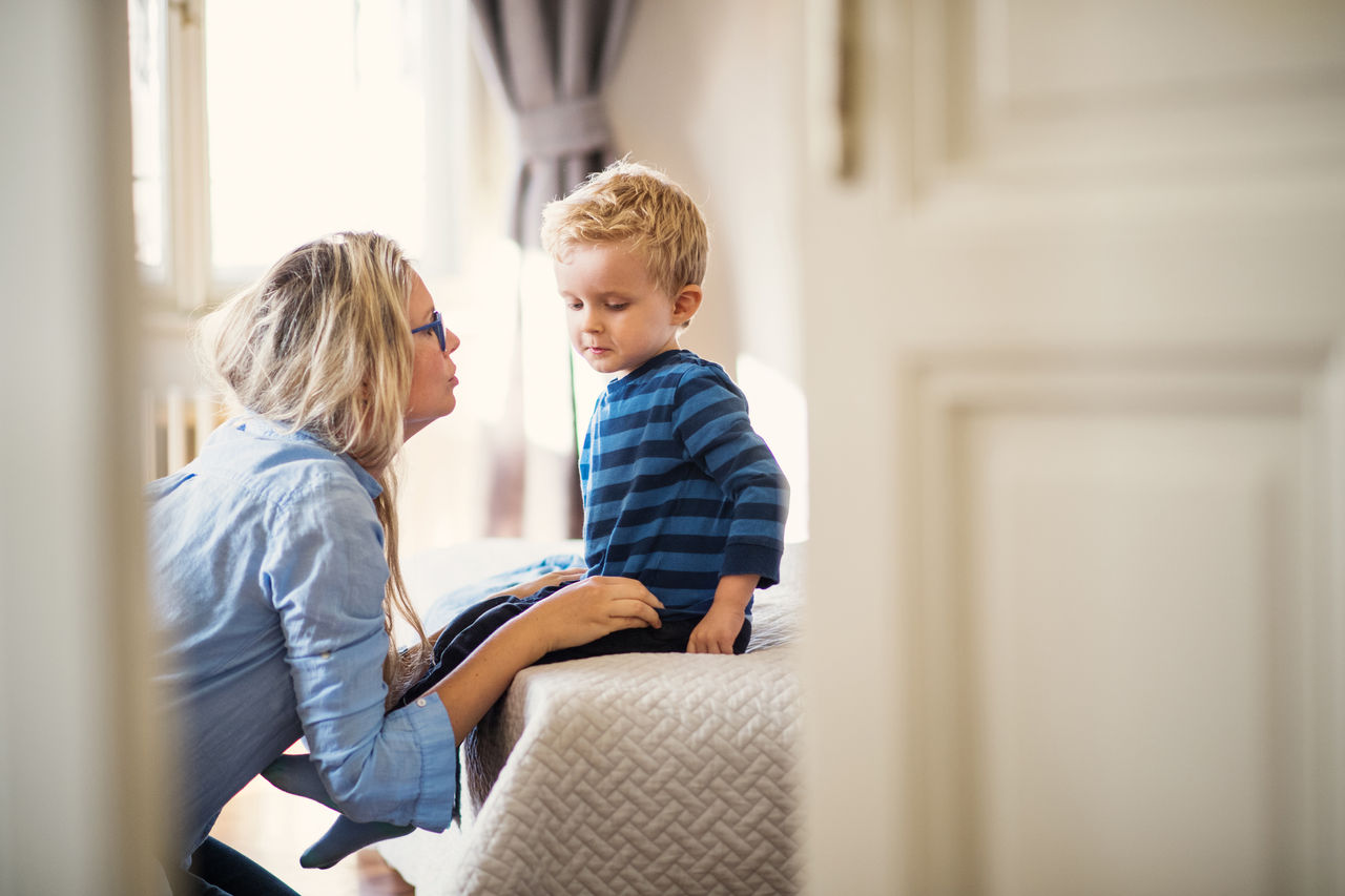 A mother talking with her child